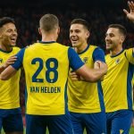 Spelers van STVV vieren een doelpunt tijdens een wedstrijd