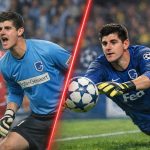 Jonge doelman in blauw shirt duikt naar de bal in een vol stadion