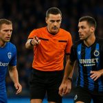 Scheidsrechter Lawrence Visser fluit tijdens KRC Genk - Club Brugge