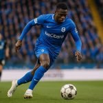 KRC Genk-speler in actie tijdens een competitiewedstrijd
