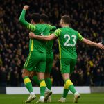 Spelers van Norwich City vieren een doelpunt in een wedstrijd in The Championship.