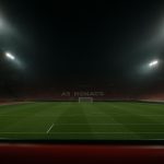 Sfeervol stadion van AS Monaco onder de lichten tijdens een avondwedstrijd