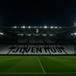 Stadion van Juventus onder de avondlijke stadionlichten