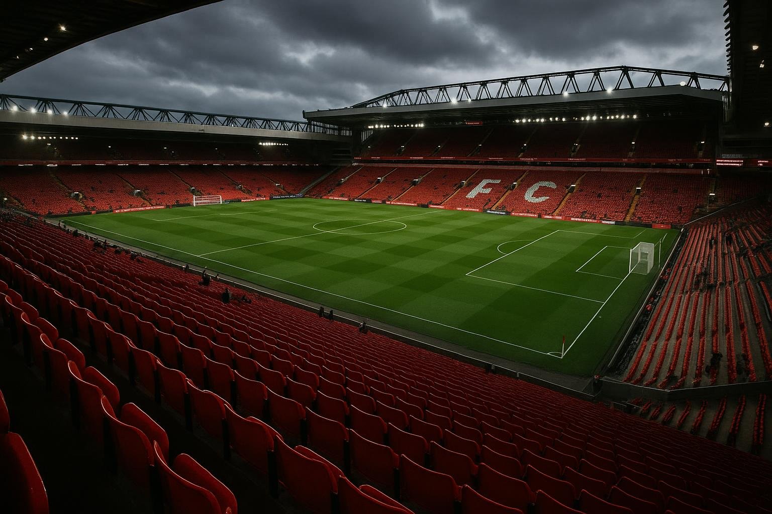 Stadion van Liverpool met rood-witte tribunes onder de lichten