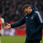 Ajax-coach Fred Grim oogt aangeslagen langs de zijlijn na de zware bekeruitschakeling tegen AZ.