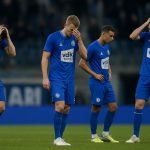Spelers van KAA Gent reageren ontgoocheld na de bekeruitschakeling tegen Anderlecht