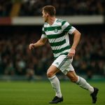 Arne Engels in actie in het shirt van Celtic tijdens een wedstrijd.