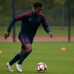 Sfeerbeeld van een training in Ajax-kledij zonder herkenbare gezichten