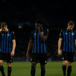 Spelers van Club Brugge stappen van het veld in het Metropolitano na de Europese uitschakeling