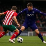 Spelmoment tijdens Zulte Waregem tegen Anderlecht, een duel om de bal