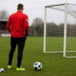 Standaards doelman Matthieu Epolo tijdens een sessie op het trainingsveld