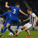 Spelers van KRC Genk vieren een doelpunt in de Cegeka Arena tegen Anderlecht