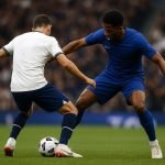 Actiefoto van Cristian Romero in het shirt van Tottenham Hotspur tijdens een wedstrijd