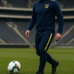 Ross Sykes van Union SG tijdens een training, gezien vanop de rug