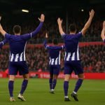 Spelers van RSC Anderlecht vieren op de Bosuil na de 0-4-zege tegen Antwerp in de beker.