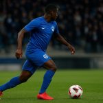 Joris Kayembe van KRC Genk tijdens een wedstrijd in het stadion