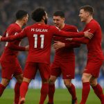 Liverpool viert een moment in de FA Cup-wedstrijd tegen Brighton, met focus op Salah zonder herkenbare gezichten.