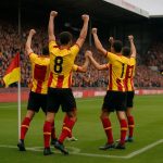 Spelers van KV Mechelen vieren een laat doelpunt in het stadion