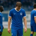 Spelers van KRC Genk in een teleurgesteld moment tijdens een wedstrijd