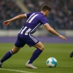Fabrice N'Sakala in actie voor RSC Anderlecht tijdens een wedstrijd.