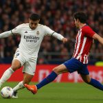 Vinicius Junior viert na een doelpunt in de Madrileense derby tussen Real Madrid en Atlético Madrid.