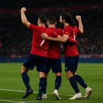 Nathan Ngoy viert na een beslissend doelpunt voor Lille in de slotfase.
