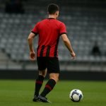 Actiefoto van Manoël Verhaeghe in duel voor RWDM tijdens een wedstrijd