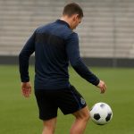 Trainingmoment bij Club Brugge met een spits op de voorgrond, zonder herkenbare gezichten.