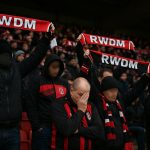 Supporters van RWDM in het stadion tijdens een wedstrijd in de Challenger Pro League