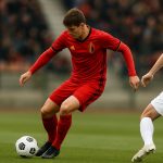 Nathan De Cat in actie in het shirt van de Rode Duivels