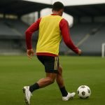Mika Godts in trainingstenue tijdens een oefensessie op stage met de nationale ploeg