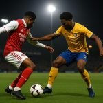 Actiefoto uit Mansfield Town tegen Arsenal in de FA Cup, met duels op het veld zonder herkenbare gezichten.