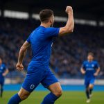 Spelers van KRC Genk vieren een doelpunt tijdens een wedstrijd