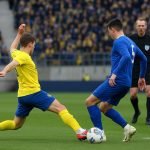 Spelmoment bij Union Saint-Gilloise tegen KRC Genk met een duel dat tot discussie leidde over de kaart