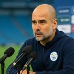 Pep Guardiola tijdens een persmoment van Manchester City in Madrid voor een duel met Real Madrid in de Champions League.