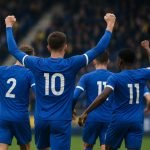 Spelers van KRC Genk vieren na de derbyzege tegen Sint-Truiden