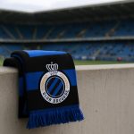 Stadionbeeld met Club Brugge-kleuren in transfercontext, zonder herkenbare gezichten