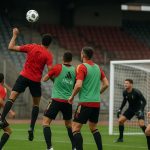 Spelers van de Rode Duivels verdedigen een corner tijdens een trainingsmoment