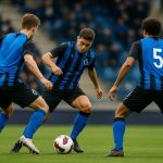 Spelers van Club Nxt in actie tijdens een Youth League-wedstrijd