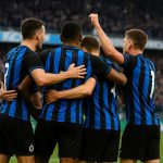 Spelers van Club Brugge vieren een doelpunt in een uitmatch in Gent.