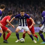 Spelers van RSC Anderlecht in wedstrijdsituatie na een tactische verschuiving op het middenveld