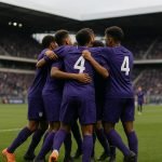 Spelers van RSC Anderlecht vieren de Future Cup na de finale tegen Real Madrid in Amsterdam.