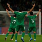 Spelers van Irak vieren na de 2-1 zege tegen Bolivia in de intercontinentale WK-play-offs