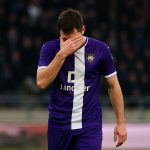 Enrick Llansana van RSC Anderlecht in wedstrijdcontext na de nederlaag tegen Club Brugge, met stadionachtergrond.