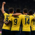 Spelers van Union vieren samen na een doelpunt tijdens een play-offwedstrijd.