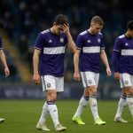 Spelers van RSC Anderlecht reageren teleurgesteld na de nederlaag tegen Club Brugge
