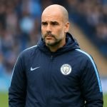 Pep Guardiola langs de zijlijn bij Manchester City in een wedstrijdcontext