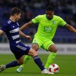Spelers van RSC Anderlecht en KAA Gent in duel tijdens een wedstrijdmoment
