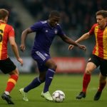 Spelers van Anderlecht vieren een uitzege in het stadion van KV Mechelen.