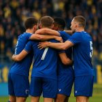 Spelers van KRC Genk vieren een doelpunt op bezoek bij KVC Westerlo in de Europe Play-Offs.